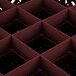 A close-up of a red grid of squares on a box.