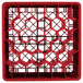 A red plastic Vollrath Traex glass rack with 30 compartments and holes in it.