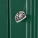A green door with a Rubbermaid Plaza dark green square container with a side opening as a handle.