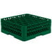 A green plastic Vollrath Traex glass rack with holes.