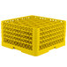 A yellow plastic Vollrath Traex glass rack with 30 compartments for small items.