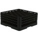 A black Vollrath Traex glass rack with 30 compartments.