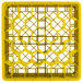 A yellow plastic Vollrath Traex glass rack with hexagons.