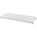 A white rectangular Cambro Camshelving® Premium shelf with white rectangular ends.