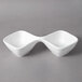 A white square porcelain divided bowl with 2 divided sections and a lid.