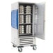 A large metal refrigerated cabinet with silver trays inside.