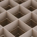 A white Vollrath Traex glass rack grid with 36 squares.