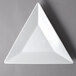 A white triangle shaped plate.