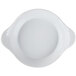 A white shirred egg dish with handles.