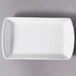 A white rectangular porcelain tid bit tray.