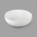 A 10 Strawberry Street Whittier white porcelain faceted bowl with a ribbed rim.