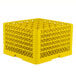 A Vollrath Traex yellow plastic rack with 36 compartments and a grid pattern.