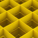 A yellow Vollrath Traex grid for glassware with 36 compartments.