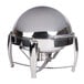 A Vollrath stainless steel round chafer with a roll top lid.