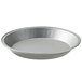 A close-up of a silver Vollrath Wear-Ever anodized aluminum pie pan.