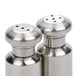 An American Metalcraft stainless steel salt and pepper shaker set on a counter.