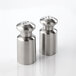 An American Metalcraft stainless steel salt and pepper shaker set on a white surface.