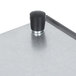 A black and silver Hatco heated shelf warmer with a black knob on a metal surface.