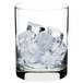 A glass of ice cubes on a white background.