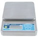 An Edlund Poseidon waterproof digital portion scale on a white surface.