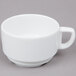 An Arcoroc white porcelain cup with a handle.