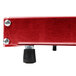 A close-up of a red rectangular Hatco heated shelf warmer with a black knob.