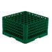 A green plastic Vollrath Traex glass rack with many compartments and holes.