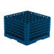 A blue plastic Vollrath Traex glass rack with many compartments and holes.