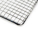 A stainless steel mesh fryer screen.