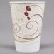 A white Solo paper cold cup with red swirl designs.