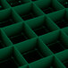 A close up of a green Vollrath Traex glass rack grid.