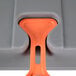 A Metro bow tie dunnage rack with orange plastic handles.