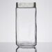 An Anchor Hocking clear glass container with a silver lid.