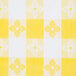 A yellow and white checkered tablecloth with flowers.