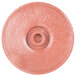 A pink polyethylene tortilla server disc with a hole in the center.