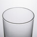 An Arcoroc beverage glass with a white background.