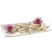 A white Tablecraft melamine tray with starfish and purple flowers.