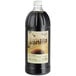 A black bottle of Regal 32 fl. oz. Imitation Vanilla liquid.