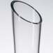 A clear glass tube with a curved edge and a thin rim.