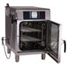 A large Alto-Shaam stainless steel Combitherm oven with a door open.