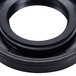 A black rubber seal with a metal ring.