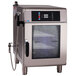 An Alto-Shaam Combitherm CT Express commercial oven with a glass door and stainless steel rack.