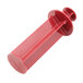 A red plastic small vegetable pusher with a screw on lid.