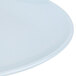 A close-up of a blue Thunder Group melamine platter with an oval rim.