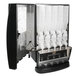 A black Bunn iMIX-5S+ cappuccino dispenser with several plastic containers.