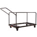 A black metal National Public Seating round folding table dolly with wheels and a handle.