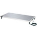 A white rectangular Hatco heated shelf on a metal table with a power cord.
