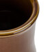 A close up of a brown Tuxton China Princess mug.