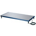 A blue rectangular Hatco Glo-Ray heated shelf on a table with a black cord.