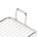 A stainless steel Avantco bottom grate with handles.